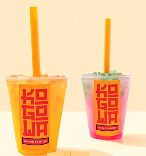 Two Kogowa slushes in Kogowa cups with yellow straws